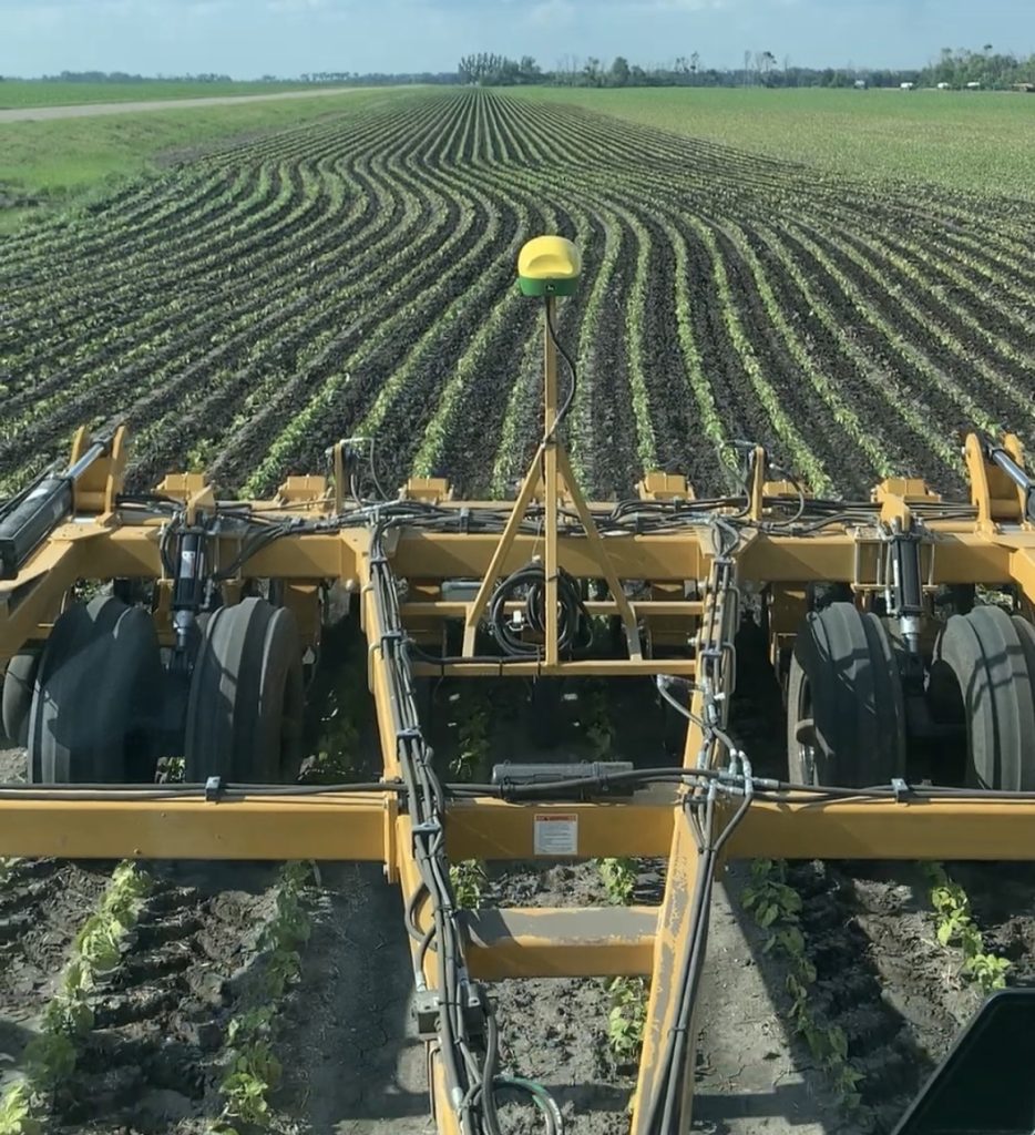 Alloway 3130 pull-type 36-row cultivator with GPS steering in an extreme turn